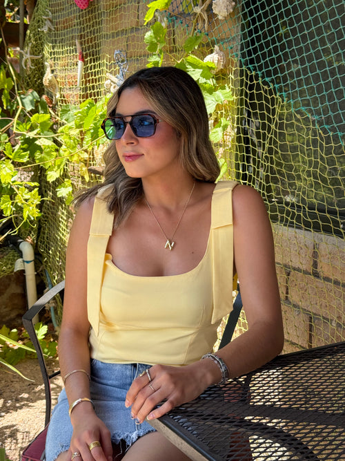 BLUSA AMARILLA MOÑO