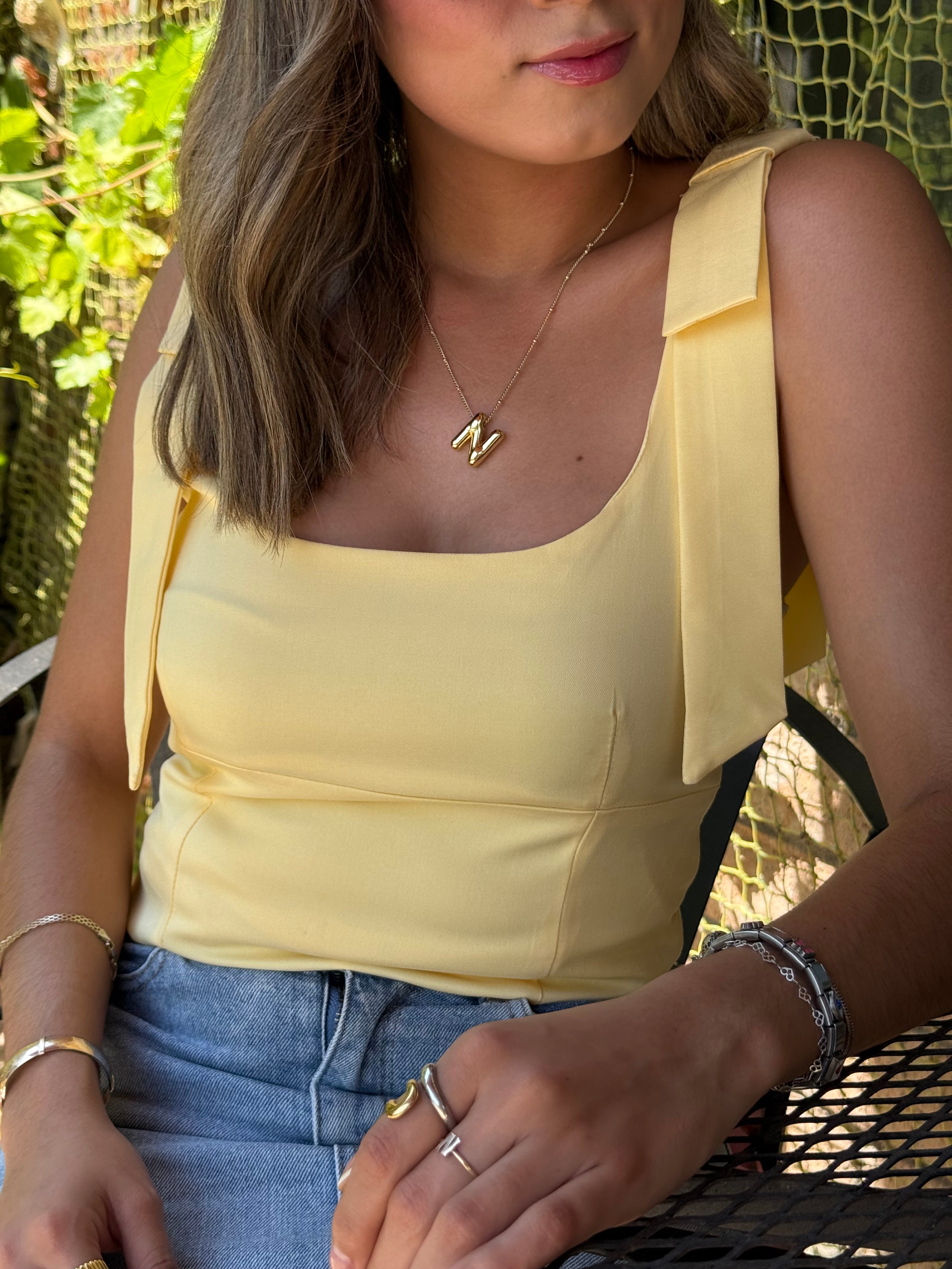 BLUSA AMARILLA MOÑO